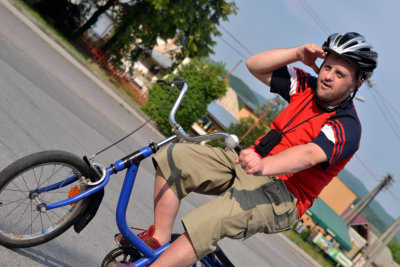 down syndrome man on bike